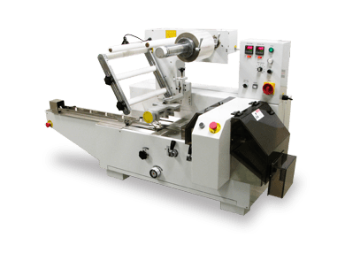 Flow outlet wrap machine